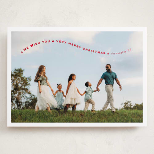 This is a poinsettia holiday photo cards with standard by Erica Krystek called simple twist printing on recycled smooth signature in grand