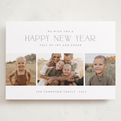This is a frost holiday photo cards with standard by Wildfield Paper Co called holiday snapshots printing on recycled smooth signature in grand