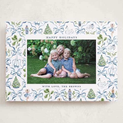 This is a blue ribbon holiday photo cards with standard by Sarah Knight called nutcracker ribbons printing on recycled smooth signature in grand