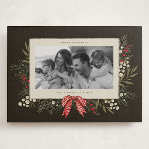 This is a holly berry holiday photo cards with standard by Wildfield Paper Co called vintage garland printing on recycled smooth signature in grand
