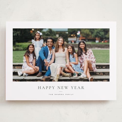 This is a pine holiday photo cards with standard by Wildfield Paper Co called daisies printing on recycled smooth signature in grand