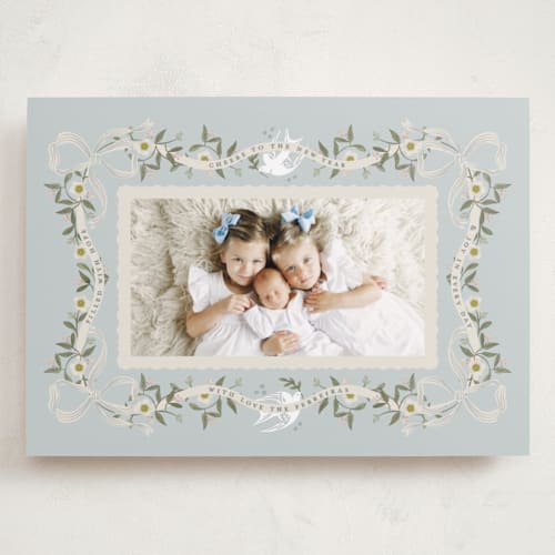 This is a blue spruce holiday photo cards with standard by Ana de Sousa called ribbon of grace printing on recycled smooth signature in grand