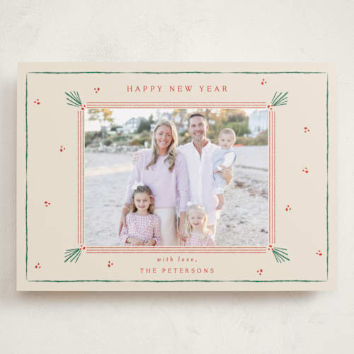 This is a holly holiday photo cards with standard by Sarah Rosenthal called holly tidings printing on recycled smooth signature in grand