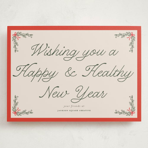 This is a cherry glaze holiday photo cards with standard by Morgan Kendall called garland printing on signature in grand