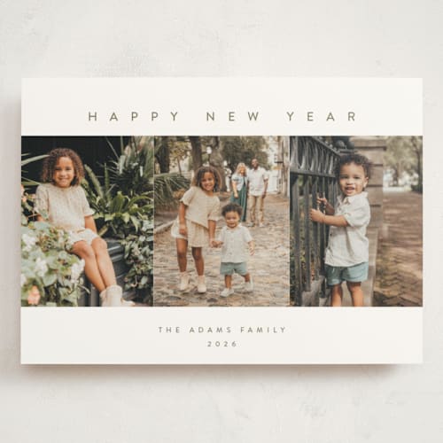This is a snowfall holiday photo cards with standard by Pippa Shaw called trilogy printing on signature in grand