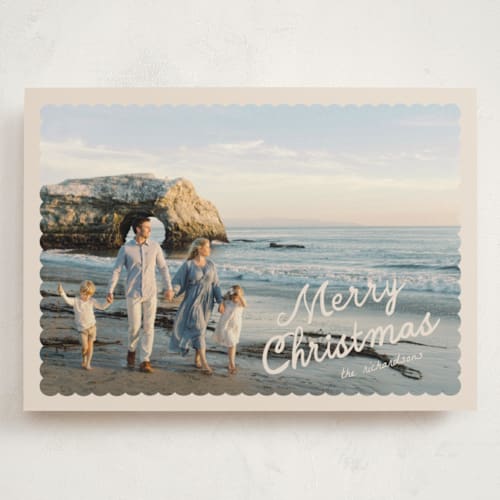 This is a creamer holiday photo cards with standard by Pixel and Hank called dispatch printing on signature in grand