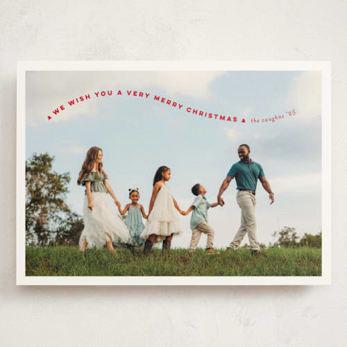 This is a poinsettia holiday photo cards with standard by Erica Krystek called simple twist printing on signature in grand