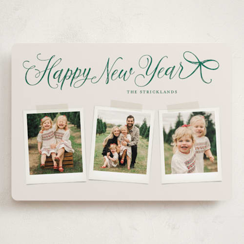 This is a evergreen holiday photo cards with standard by Hooray Creative called scripted red bow printing on recycled smooth signature in grand