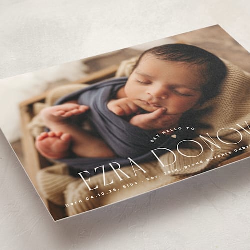 This is a caramel petite birth announcements with standard by Corinne Malesic called little heart printing on signature in petite