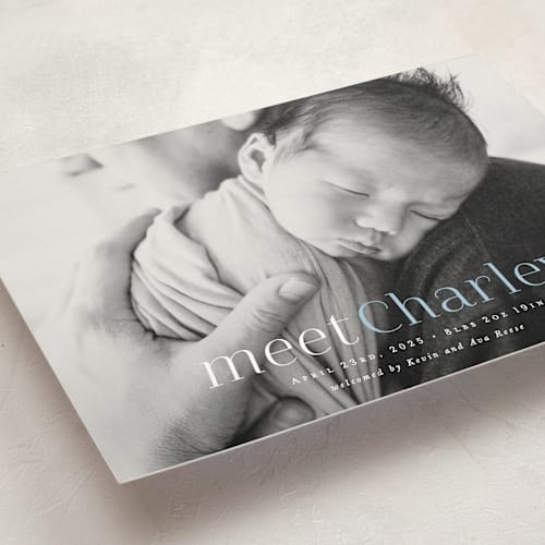 This is a sky blue birth announcement postcards with standard by Hooray Creative called meet charley printing on signature in postcard