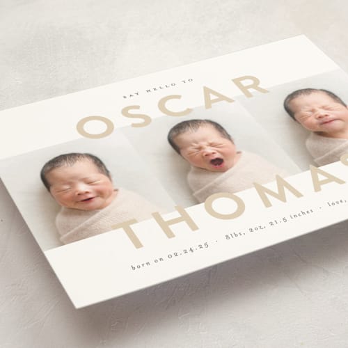 This is a sand birth announcement postcards with standard by Carolyn MacLaren called trio overlay printing on signature in postcard