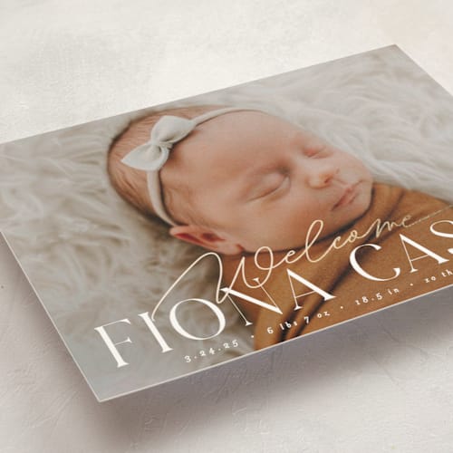 This is a cotton birth announcement postcards with foil pressed by Everett Paper Goods called welcoming printing on signature in postcard