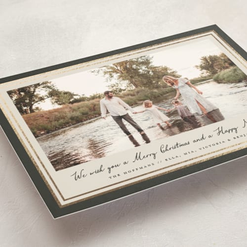 This is a olive christmas postcards with foil pressed by Petra Kern called oasis printing on signature in postcard