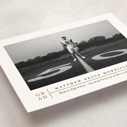 This is a golden graduation announcements with standard by Erica Krystek called modern grid printing on signature in petite