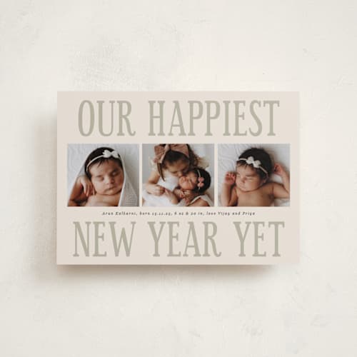 This is a champagne babys first christmas with standard by Corinne Malesic called something kind of wonderful printing on recycled smooth signature in petite