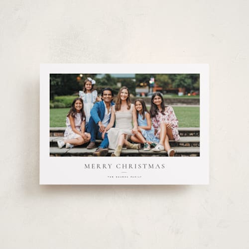 This is a pine petite holiday cards with standard by Wildfield Paper Co called daisies printing on recycled smooth signature in petite