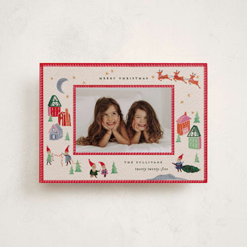 This is a santa petite holiday cards with standard by Julie Murray called north pole party printing on recycled smooth signature in petite