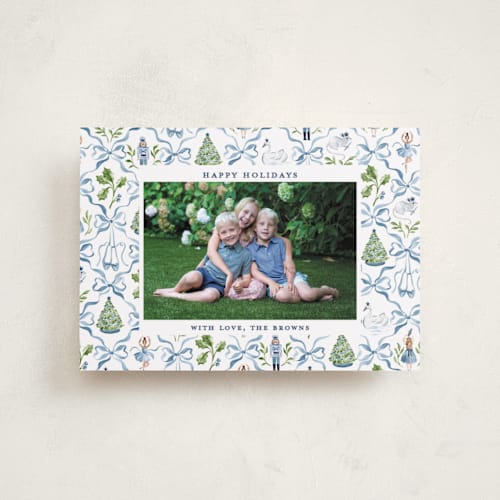 This is a blue ribbon petite holiday cards with standard by Sarah Knight called nutcracker ribbons printing on recycled smooth signature in petite