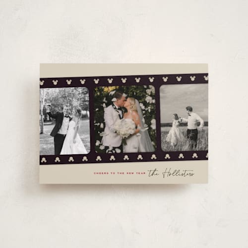 This is a retro petite holiday cards with standard by Kamala Nahas called mickey filmstrip printing on recycled smooth signature in petite