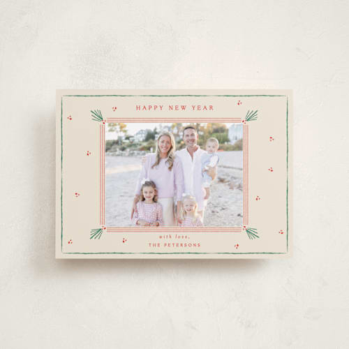 This is a holly petite holiday cards with standard by Sarah Rosenthal called holly tidings printing on recycled smooth signature in petite