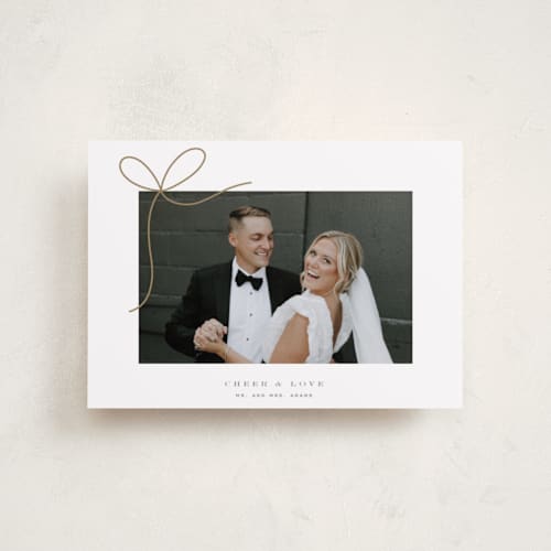 This is a winter petite holiday cards with standard by Yuliya Evseeva called little bow printing on recycled smooth signature in petite
