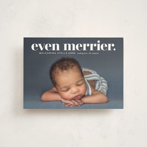 This is a snow babys first christmas with standard by Lori Wemple called even merrier. printing on signature in postcard