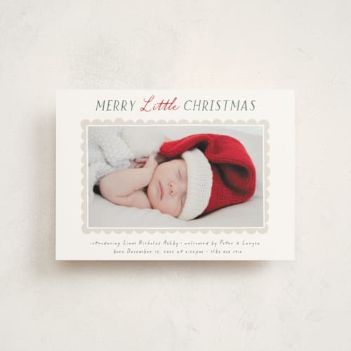 This is a holly babys first christmas with standard by Hooray Creative called merry scallop printing on signature in postcard