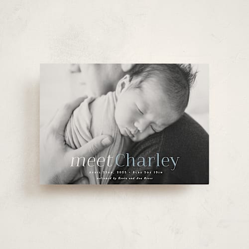This is a sky blue birth announcement postcards with standard by Hooray Creative called meet charley printing on signature in postcard
