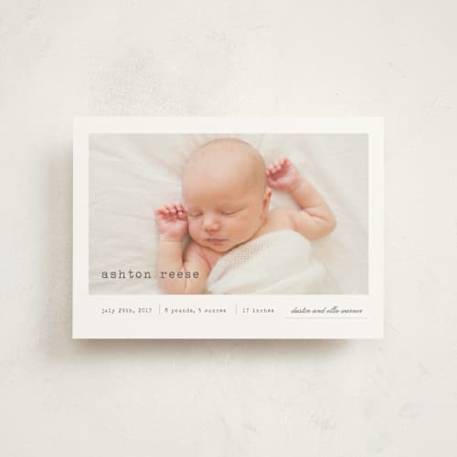 This is a soft grey birth announcement postcards with standard by Sara Hicks Malone called on display printing on signature in postcard