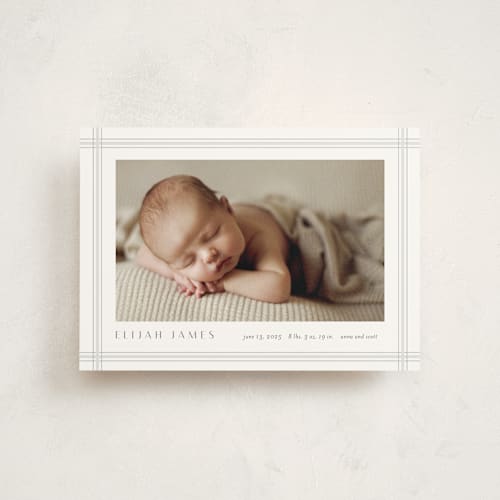 This is a cement birth announcement postcards with standard by Stacey Meacham called soft plaid printing on signature in postcard
