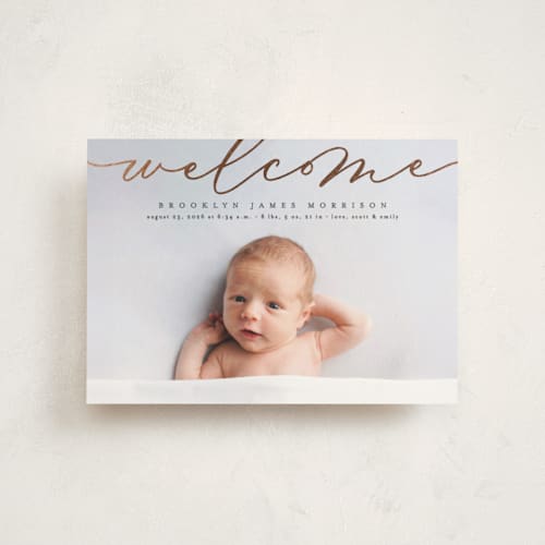 This is a charcoal birth announcement postcards with foil pressed by Erica Krystek called welcome ribbon printing on signature in postcard