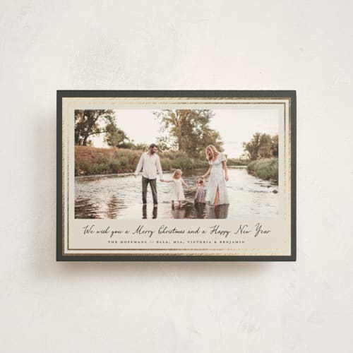 This is a olive christmas postcards with foil pressed by Petra Kern called oasis printing on signature in postcard