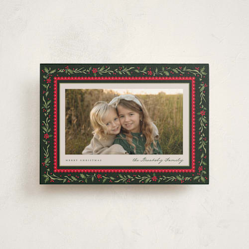 This is a festive petite holiday cards with standard by Erin L. Wilson called hollywick printing on signature in petite