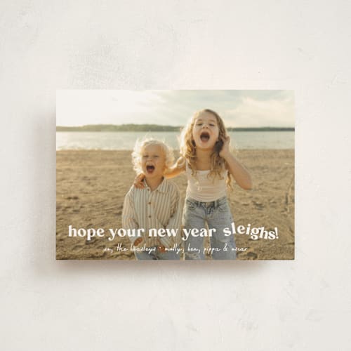 This is a snowfall christmas postcards with standard by Megan Davis called sleigh printing on signature in postcard