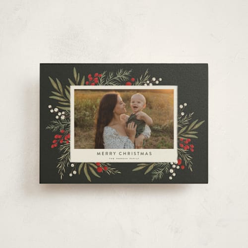 This is a garland christmas postcards with standard by Wildfield Paper Co called holly + olive printing on signature in postcard