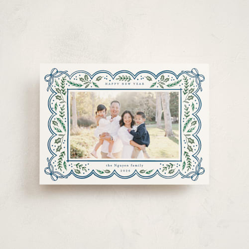 This is a navy christmas postcards with standard by Alethea and Ruth called bow corners printing on signature in postcard