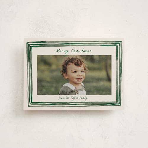 This is a forest christmas postcards with standard by Alethea and Ruth called painted frame edge printing on signature in postcard