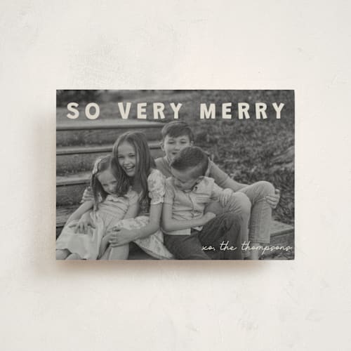 This is a cream christmas postcards with standard by Jenny Millington called merry greeting printing on signature in postcard