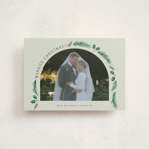 This is a sage christmas postcards with standard by Hooray Creative called a married christmas printing on signature in postcard