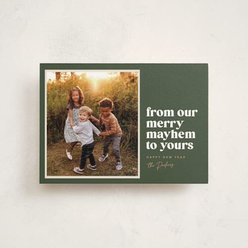 This is a pine christmas postcards with standard by Robert and Stella called our merry mayhem printing on signature in postcard