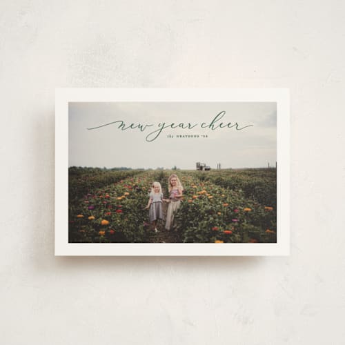This is a juniper christmas postcards with standard by Erica Krystek called happy script printing on signature in postcard