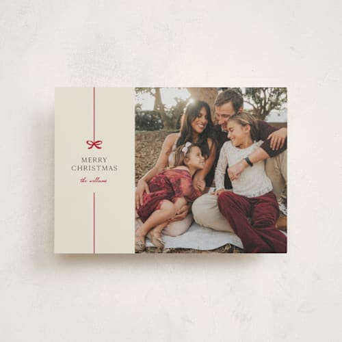 This is a poinsettia christmas postcards with standard by Pixel and Hank called bow printing on signature in postcard