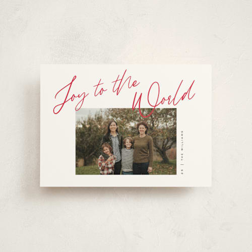 This is a cranberry christmas postcards with standard by Pixel and Hank called joy the the world scripted printing on signature in postcard