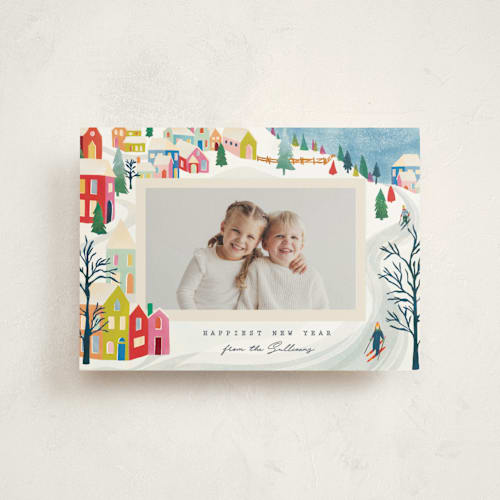 This is a bright christmas postcards with standard by Julie Murray called mountain village printing on signature in postcard