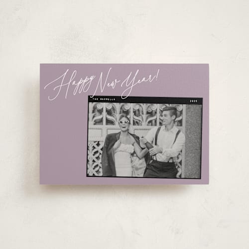 This is a plum christmas postcards with standard by Lindsay Megahed called snap printing on signature in postcard