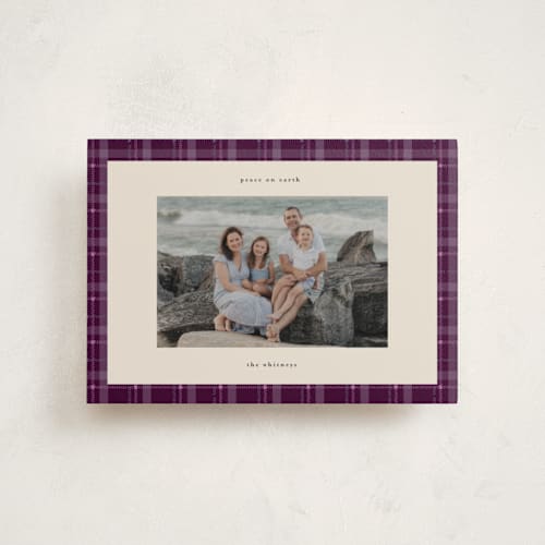 This is a plum pudding christmas postcards with standard by Makewells called plaid peace printing on signature in postcard