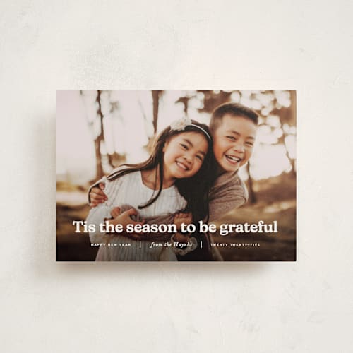 This is a snow christmas postcards with standard by Annie Clark called warmth printing on signature in postcard