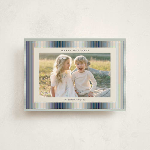 This is a navy christmas postcards with standard by Carolyn Nicks called chickadee printing on signature in postcard
