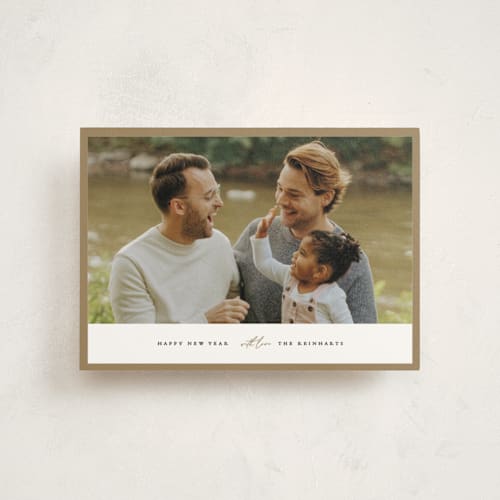 This is a coal christmas postcards with standard by Angela Thompson called edge printing on signature in postcard