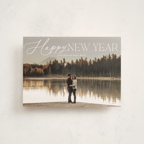 This is a snow christmas postcards with standard by Everett Paper Goods called soft mix printing on signature in postcard